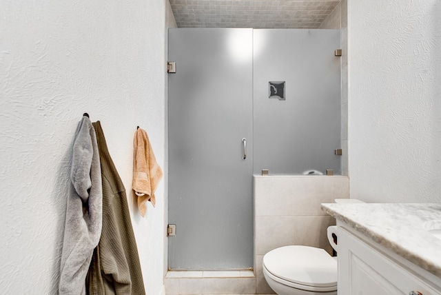 2817 W Shandon Ave, Midland, TX 79705 - full bathroom with a stall shower, vanity, and toilet