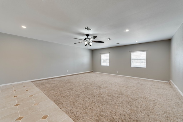 unfurnished room with recessed lighting, a ceiling fan, baseboards, and light tile patterned floors