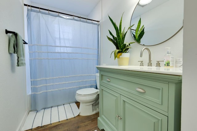 full bathroom with shower / bath combination with curtain, wood-type flooring, toilet, and vanity