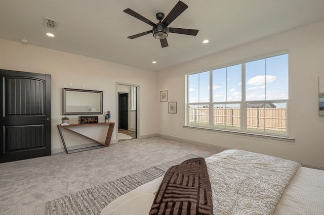 carpeted bedroom featuring ceiling fan