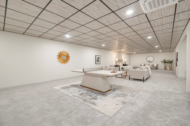 unfurnished living room featuring light colored carpet