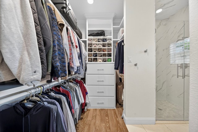1602 Cimmaron Dr, Midland, TX 79705 - walk in closet with wood finished floors