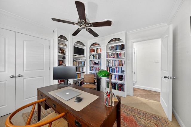 1602 Cimmaron Dr, Midland, TX 79705 - home office featuring a ceiling fan, ornamental molding, light colored carpet, and built in features