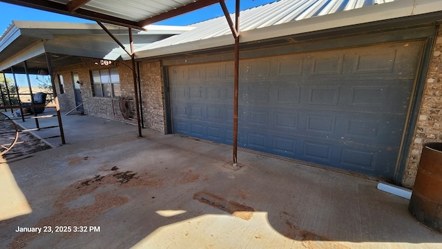 exterior space with a garage