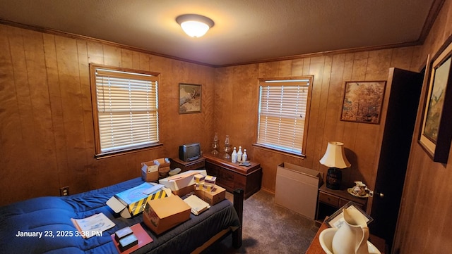 carpeted bedroom with crown molding