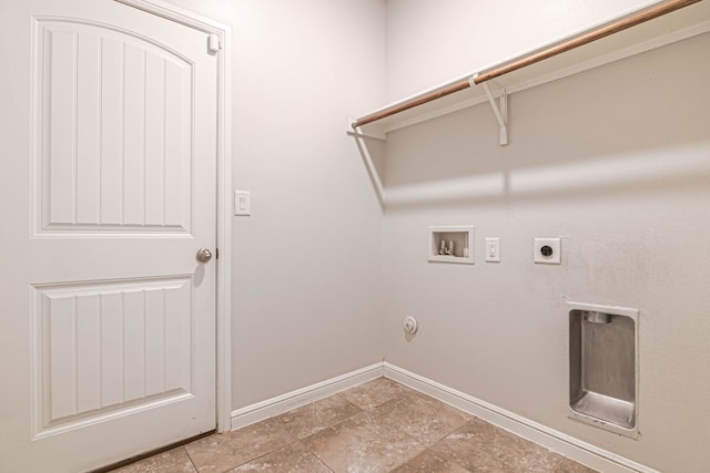 laundry area with laundry area, baseboards, hookup for a gas dryer, hookup for a washing machine, and hookup for an electric dryer