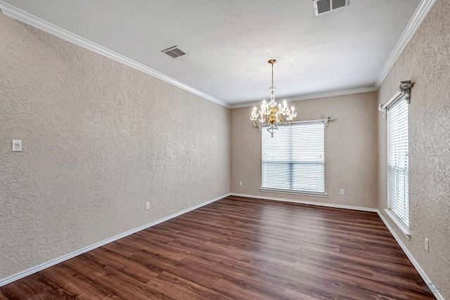 unfurnished room with a chandelier, a textured wall, dark wood-style flooring, and visible vents