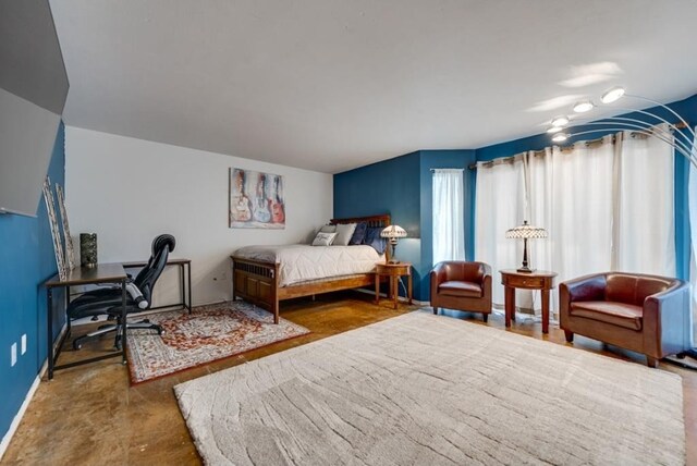 600 Liddon Unit 78, Midland, TX 79705 - bedroom with a desk and baseboards
