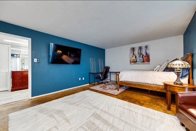 600 Liddon Unit 78, Midland, TX 79705 - carpeted bedroom featuring baseboards