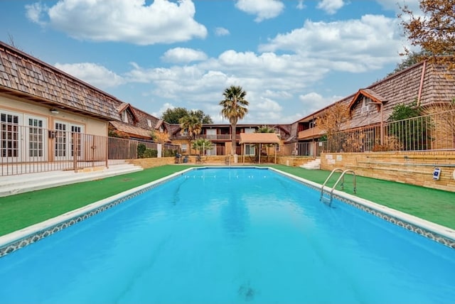 600 Liddon Unit 78, Midland, TX 79705 - view of pool with french doors
