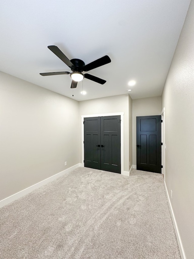 3624 Yorkshire Dr, Odessa, TX 79765 - unfurnished bedroom with ceiling fan, light colored carpet, and a closet