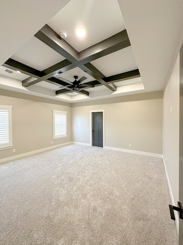 3624 Yorkshire Dr, Odessa, TX 79765 - carpeted empty room with beamed ceiling, a healthy amount of sunlight, ceiling fan, and coffered ceiling