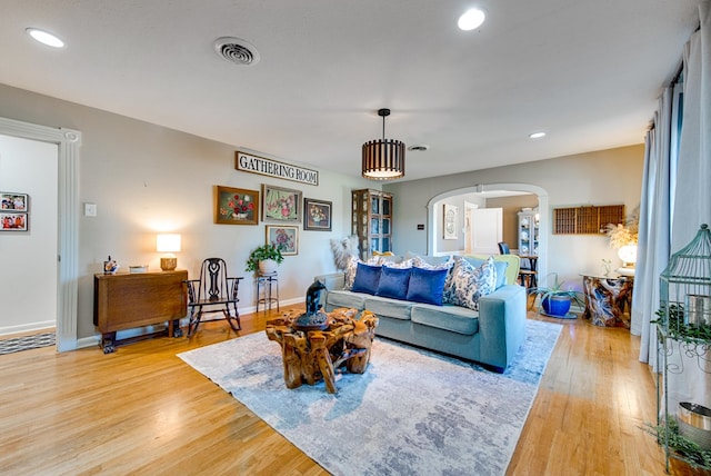 living room with light hardwood / wood-style floors