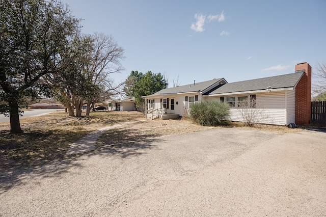 806 Boyd Ave, Midland, TX 79705 - single story home featuring a chimney and driveway