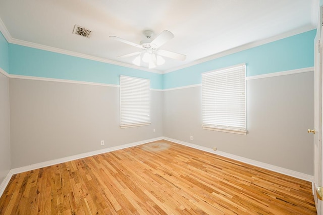 806 Boyd Ave, Midland, TX 79705 - spare room featuring a ceiling fan, light wood-style floors, baseboards, and ornamental molding