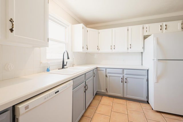 806 Boyd Ave, Midland, TX 79705 - kitchen featuring white appliances, a sink, decorative backsplash, gray cabinets, and light tile patterned floors