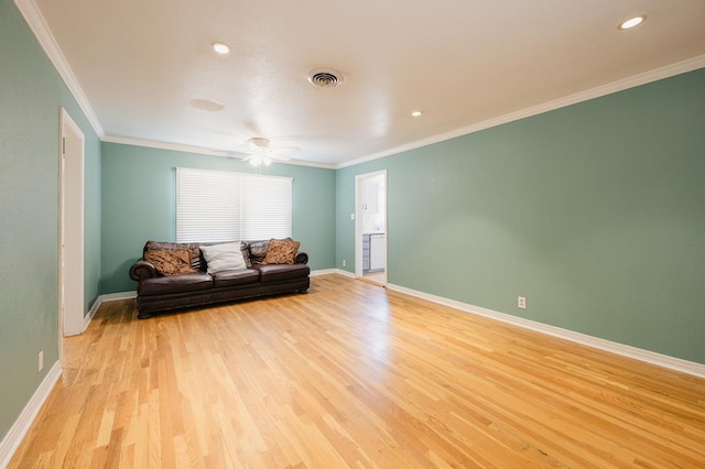 806 Boyd Ave, Midland, TX 79705 - living room with light wood finished floors, baseboards, ornamental molding, a ceiling fan, and recessed lighting