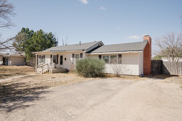 806 Boyd Ave, Midland, TX 79705 - single story home with a chimney and a porch