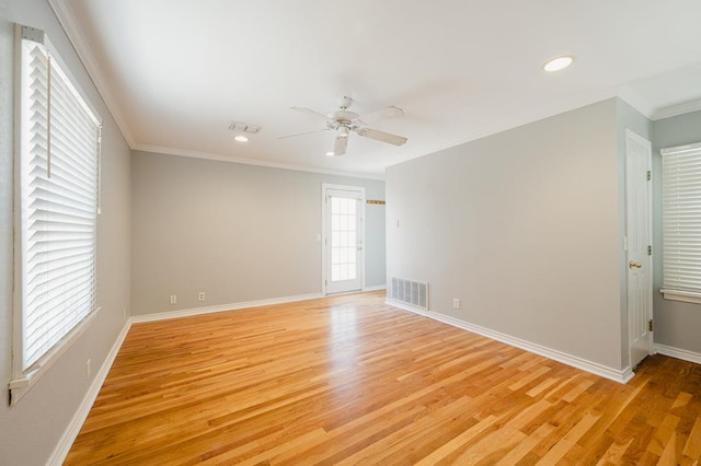 806 Boyd Ave, Midland, TX 79705 - unfurnished room featuring light wood finished floors, a ceiling fan, baseboards, crown molding, and recessed lighting