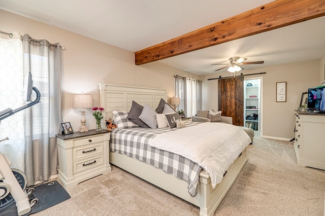 bedroom with ceiling fan, beamed ceiling, and light carpet