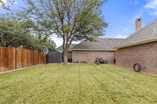 view of yard with a storage shed