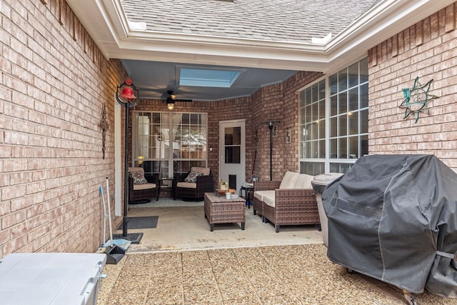 view of patio / terrace with outdoor lounge area and a grill