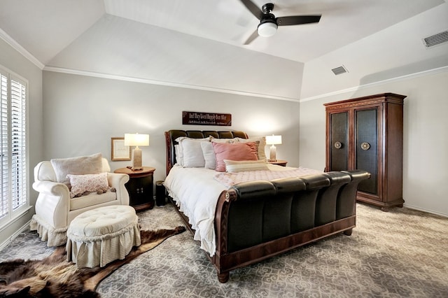 bedroom featuring multiple windows, vaulted ceiling, and visible vents