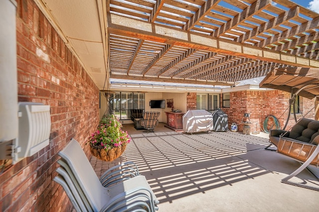 view of patio featuring a pergola