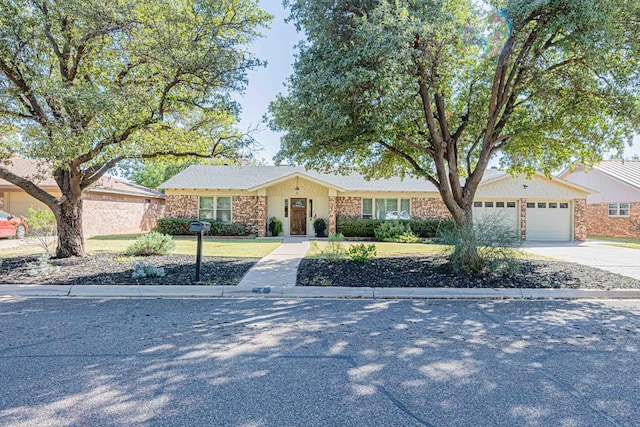 single story home with a garage