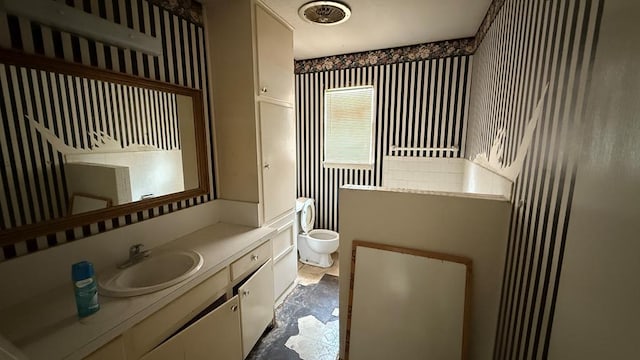 3603 Sinclair Ave, Midland, TX 79707 - bathroom with toilet and vanity