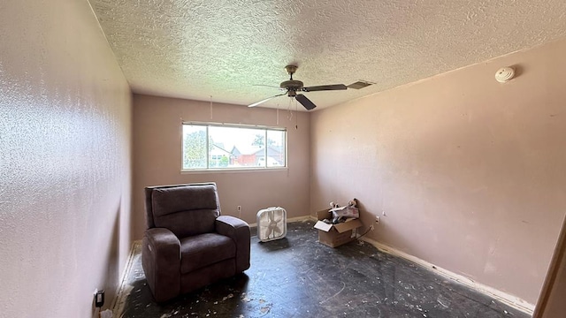 3603 Sinclair Ave, Midland, TX 79707 - living area with a ceiling fan and a textured ceiling