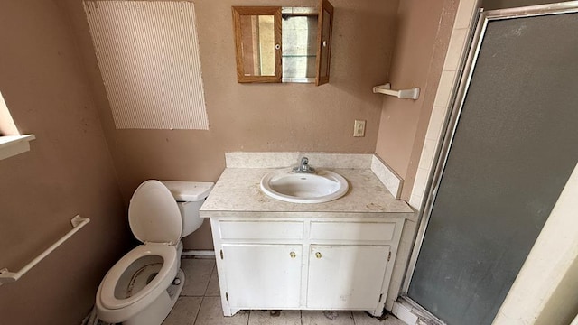 3603 Sinclair Ave, Midland, TX 79707 - full bathroom featuring vanity, a shower stall, and tile patterned floors