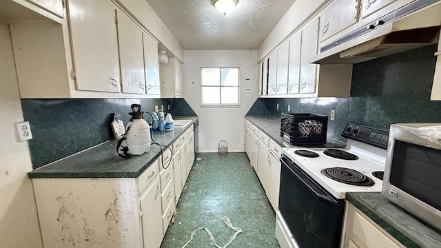 3603 Sinclair Ave, Midland, TX 79707 - kitchen with under cabinet range hood, electric range, stainless steel microwave, dark floors, and backsplash