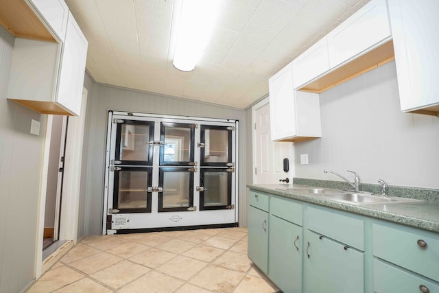 2950 Ranch Road 33, Big Spring, TX 79720 - kitchen featuring white cabinetry and vaulted ceiling