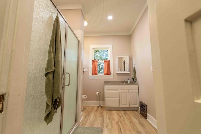 2950 Ranch Road 33, Big Spring, TX 79720 - full bathroom with vanity, a stall shower, wood finished floors, and ornamental molding