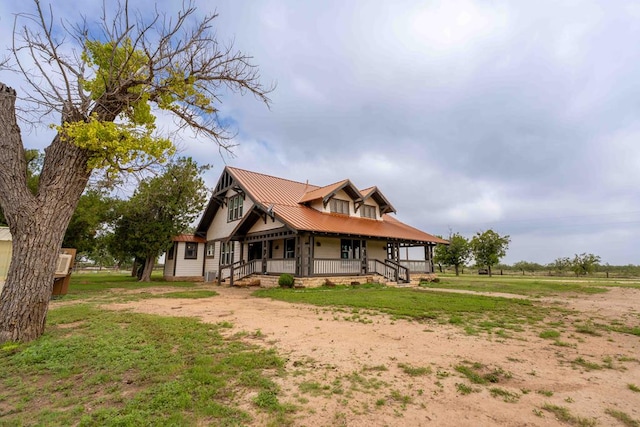 2950 Ranch Road 33, Big Spring, TX 79720 - view of front of home with a porch, a metal roof, and driveway