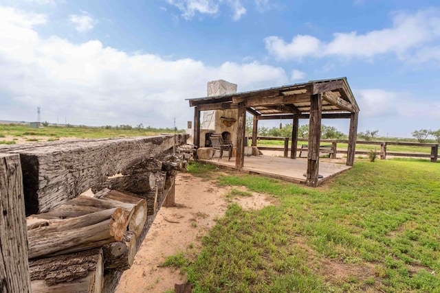 2950 Ranch Road 33, Big Spring, TX 79720 - surrounding community with a lawn and a wooden deck