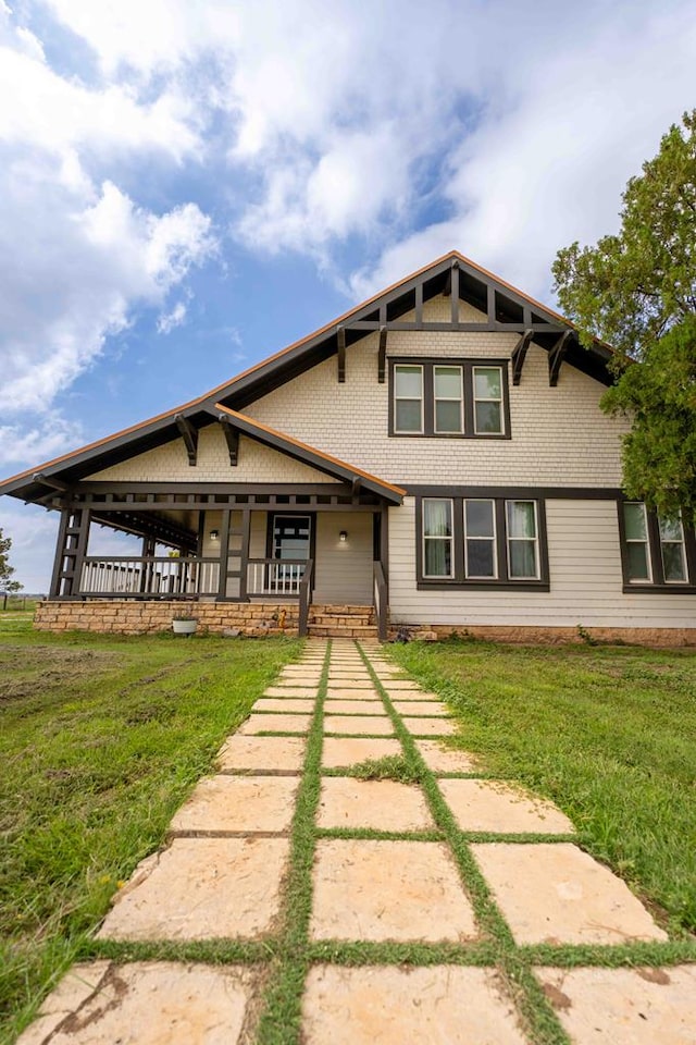 2950 Ranch Road 33, Big Spring, TX 79720 - craftsman inspired home featuring covered porch and a front yard