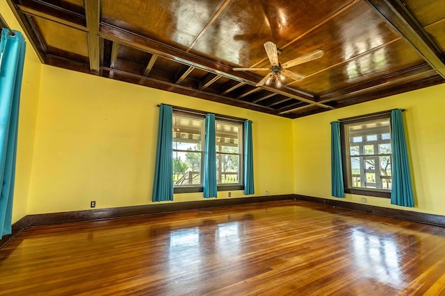 2950 Ranch Road 33, Big Spring, TX 79720 - empty room featuring plenty of natural light, wooden ceiling, wood finished floors, and a ceiling fan