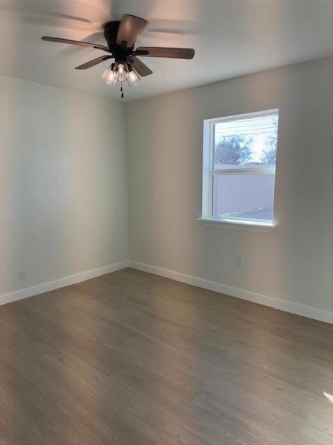 empty room featuring ceiling fan and wood-type flooring