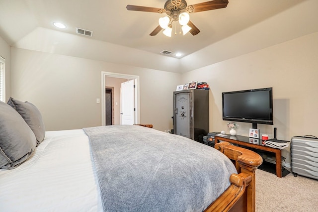 bedroom with ceiling fan and light carpet