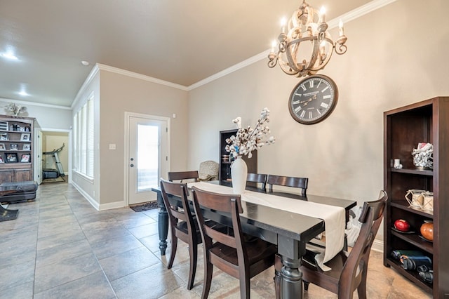 dining area with crown molding and a notable chandelier