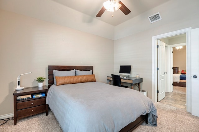 carpeted bedroom featuring vaulted ceiling and ceiling fan