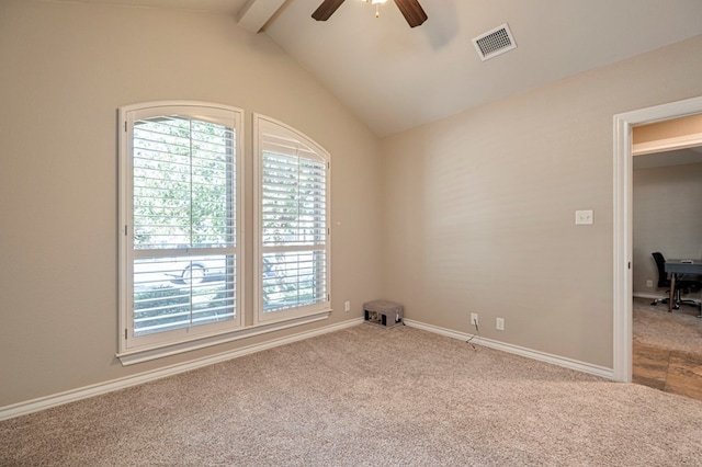 carpeted empty room featuring ceiling fan and lofted ceiling with beams