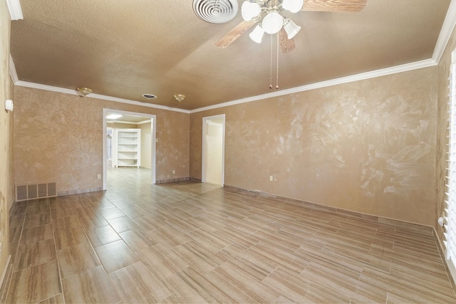 unfurnished room featuring ceiling fan, light hardwood / wood-style floors, a textured ceiling, and ornamental molding