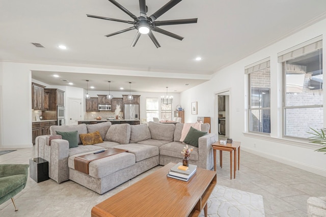 living room featuring ornamental molding, recessed lighting, visible vents, and baseboards