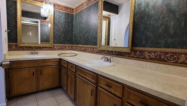 bathroom featuring tile patterned flooring and vanity