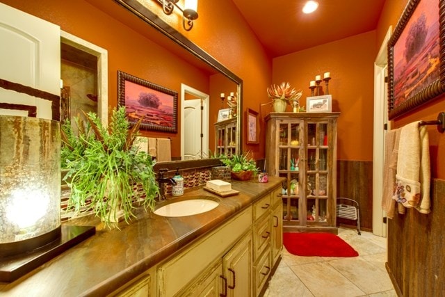 bathroom with vanity and tile patterned flooring