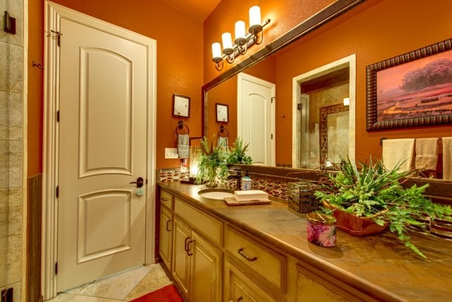 bathroom with vanity and tile patterned flooring