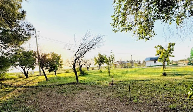5038 N Sullivan Rd, Fort Stockton, TX 79735 - view of property's community featuring a lawn